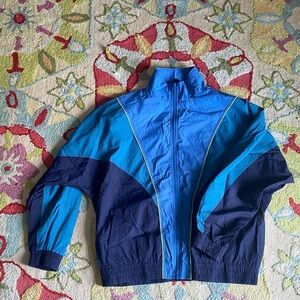 blue windbreaker